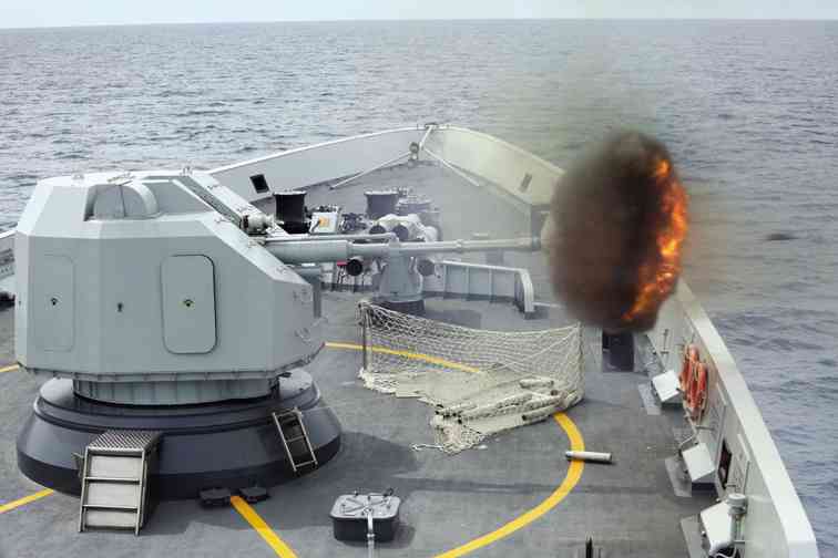 AN ANTISURFACE gun is fired from China’s Navy missile frigate Yulin during an exercise in the South China Sea.  AP/BAO XUELIN/XINHUA 