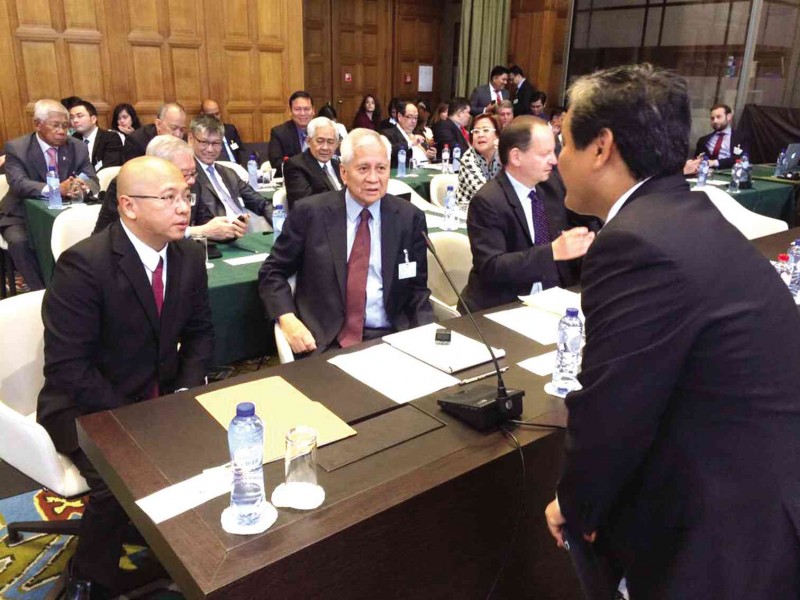 SOLICITOR General Florin Hilbay, Foreign Secretary Albert del Rosario and Philippine Ambassador to the Netherlands Vic Ledda at the Peace Palace in The Hague before the start of oral arguments on the Philippine case against China’s claims over the West Philippine Sea. PHOTOS FROM ABIGAIL VALTE’S TWITTER ACCOUNT/Permanent Court of Arbitration