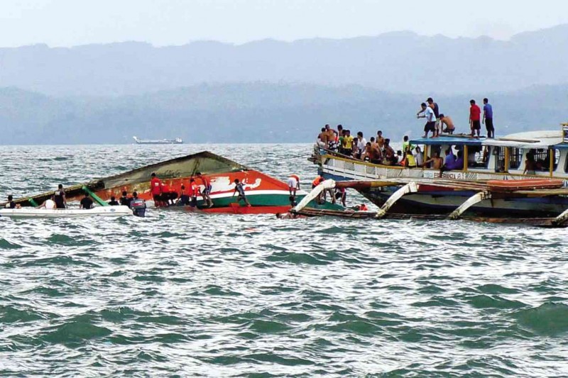 BELLY UP An overloaded MB Nirvana, an oversized outrigger, capsized a kilometer from the port of Ormoc City, Leyte province, amid bad weather, killing more than 60 people. CONTRIBUTED PHOTO/MIQUICAR PHOTO STUDIO