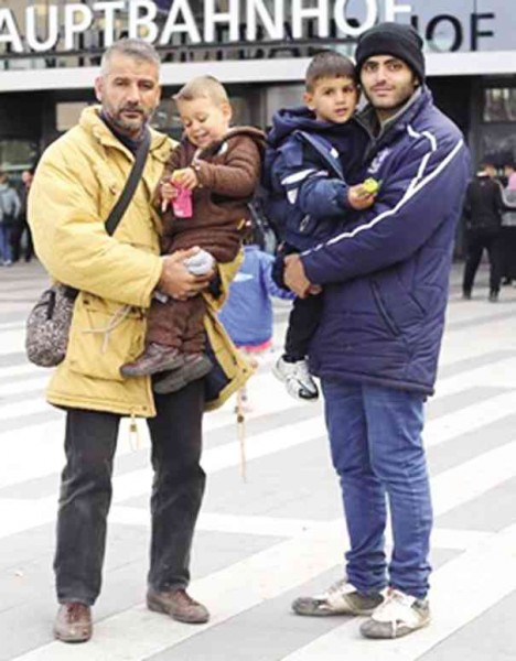 REFUGEES, who made it to Vienna, on their way to Germany  BRANDON STANTON/CONTRIBUTOR
