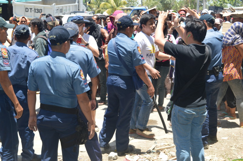 New group of protesters numbering to at least 300 arrive at Spotswood Methodist Center in Kidapawan City on Sunday noon to show support to their fellow farmers following the April 1 bloody dispersal that resulted to the death of 3 innocent persons and hurt more than 100 both from the police and the protesters' side. Williamor A. Magbanua/Inquirer Mindanao