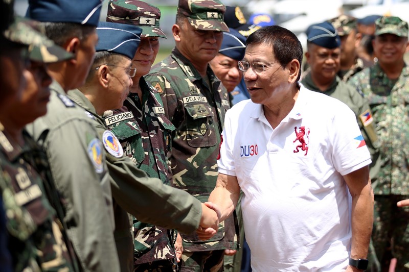 President Rodrigo R. Duterte is welcomed by officers of the Western Mindanao Command during his arrival at Edwin Andrews Airbase in Zamboanga City on July 21. KIWI BULACLAC/PPD
