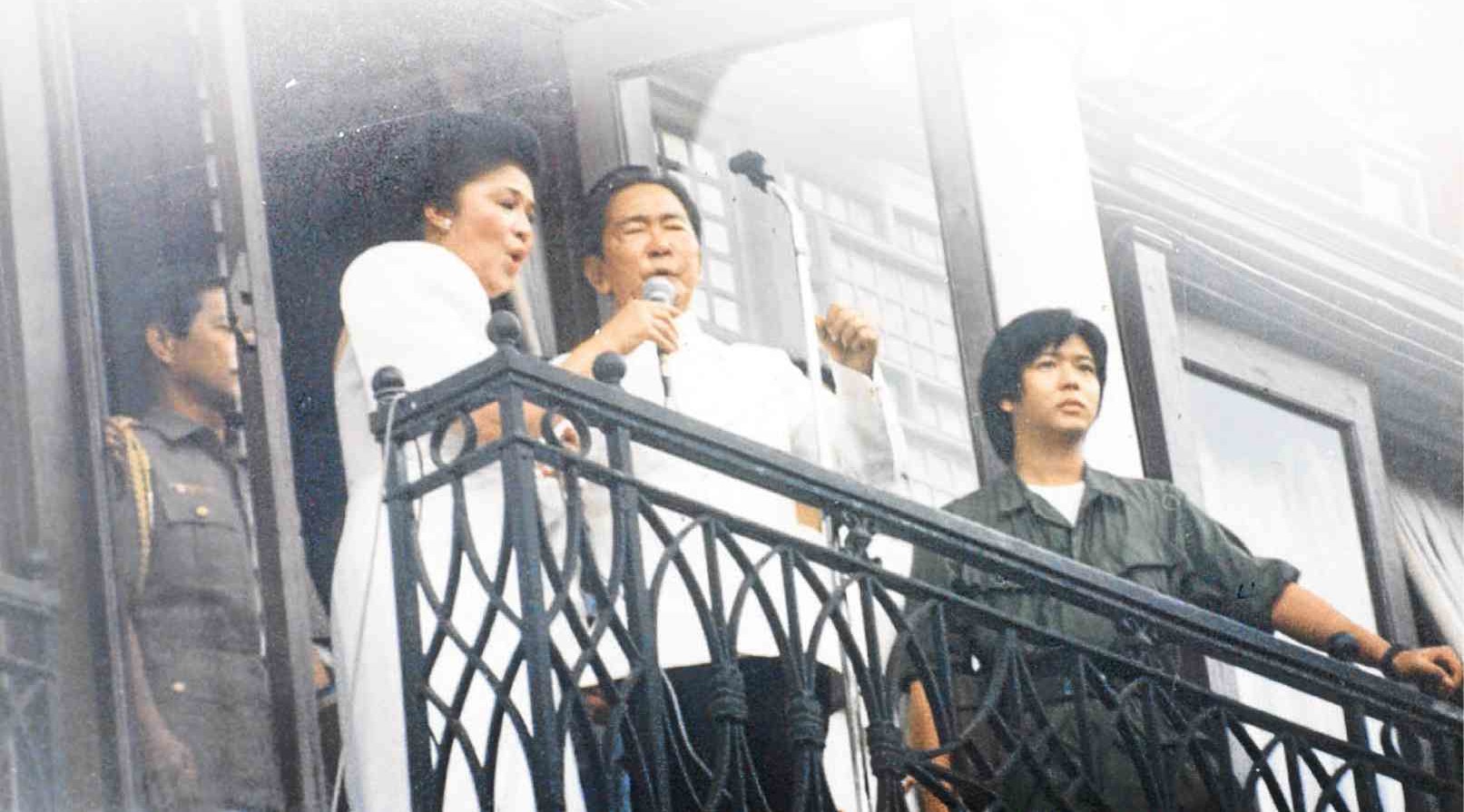 MOMENTS BEFORE THE FALL. President Ferdinand Marcos speaks from the Malacañang balcony shortly before his ouster, ending a 21-year rule, including 13 years of martial law. C. FERNANDEZ/CONTRIBUTOR